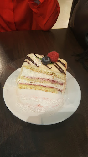 Fattigmann - Strandtorget - Gastronomi og hotellvirksomhet