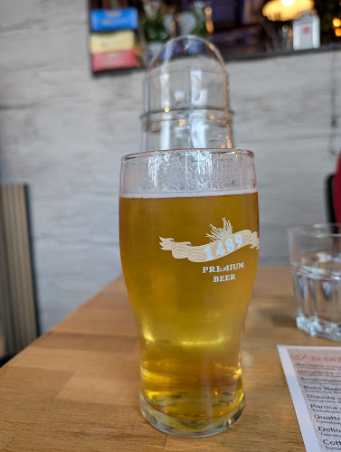 Pizzeria & Vino "La Famiglia" - Gastronomi og hotellvirksomhet