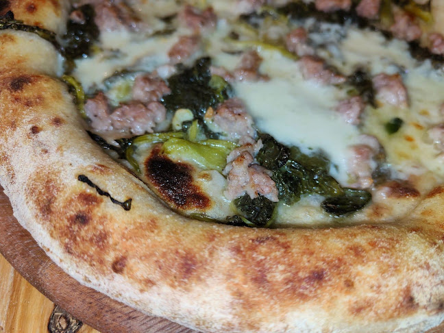 Pizzeria & Vino "La Famiglia" - Gastronomi og hotellvirksomhet