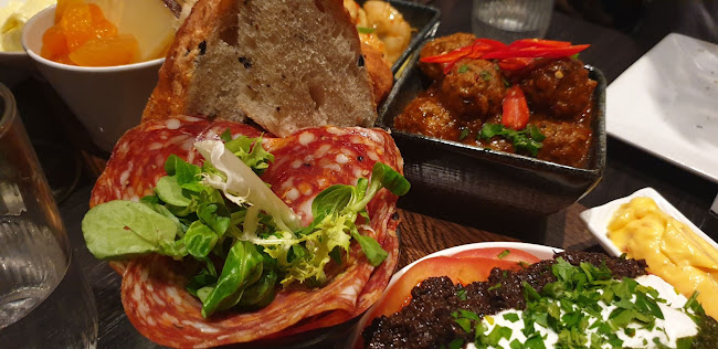 Le Monde Tapas - Gastronomi og hotellvirksomhet