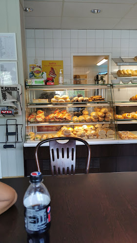 Åmli bakeri og Kafe AS - Gastronomi og hotellvirksomhet