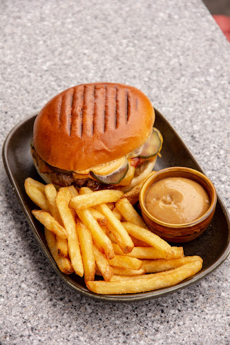 Pauls Boutique - Gastronomi og hotellvirksomhet