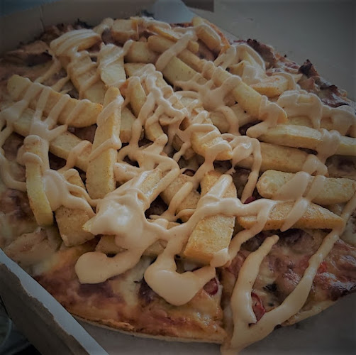 Opinii despre føynland pizza AS în Husøysund - Gastronomi og hotellvirksomhet