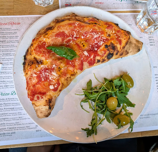 Pizzeria & Vino "La Famiglia" - Gastronomi og hotellvirksomhet