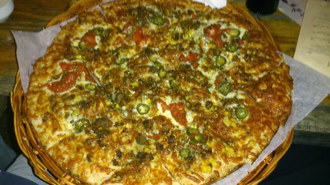 Pizzafjoset AS - Gastronomi og hotellvirksomhet