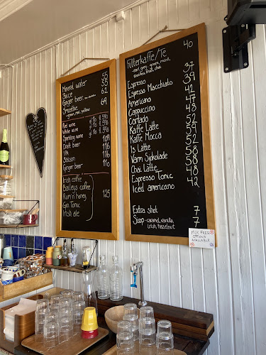 Henningsvær Lysstøperi og Cafe - Gastronomi og hotellvirksomhet