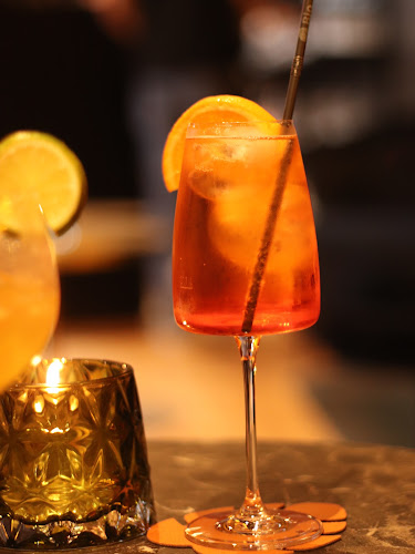 Baren i Bakgården - Gastronomi og hotellvirksomhet